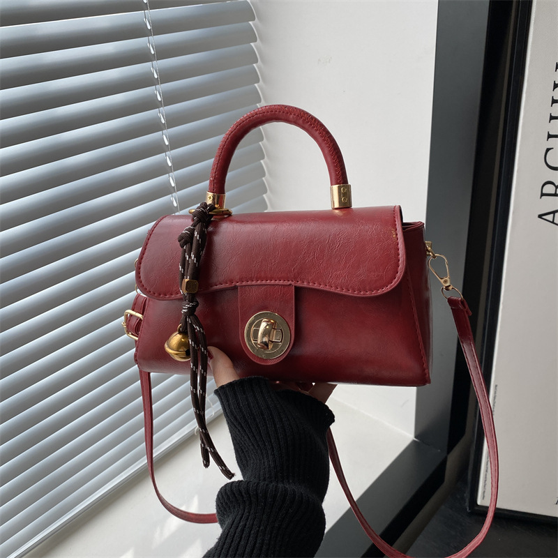 Retro simple bolso de mujer 2024 otoño invierno nuevo bolso de mano cuadrado de estilo exterior versátil alta textura mochila