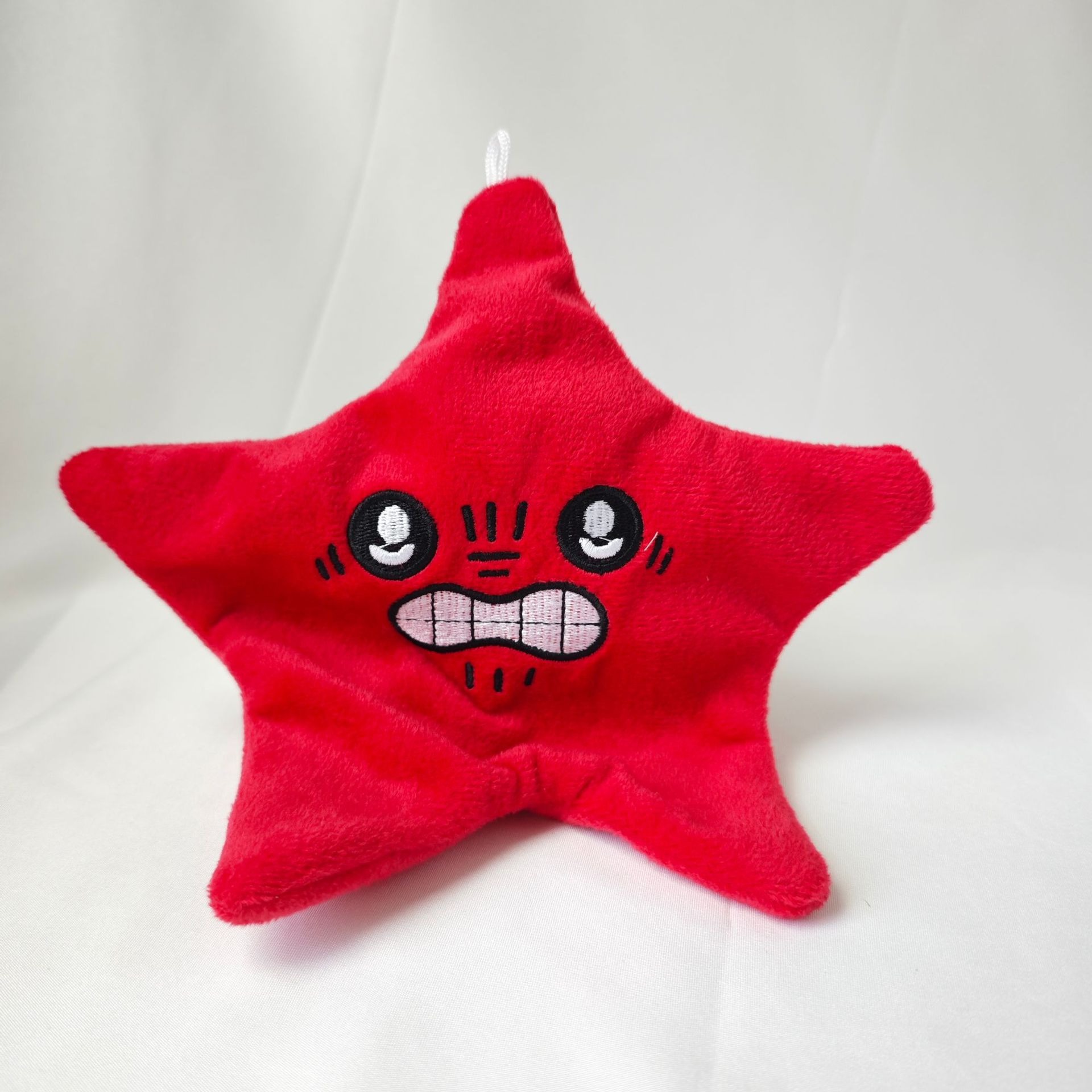 新商品の怒りっぽい派大星のぬいぐるみのペンダントは動くことができます。