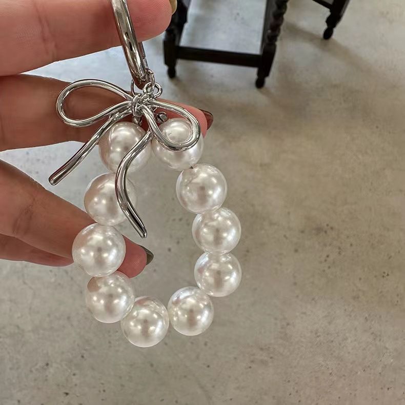 23g Weight Bag Pendant, Keychain Classification 1 Piece Quantity Holiday, Banquet, Travel Occasion Resin Material Bow Knot Pattern Plating Design Casual, Elegant, Lady Style 1 Piece Casual Elegant Lady Bow Knot Resin Plating Bag Pendant Keychain 9
