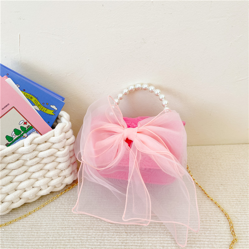 Moda estilo occidental bowknot hombro mensajero bolso lindo bebé monedero todo-Partido mini chica pequeña bolsa