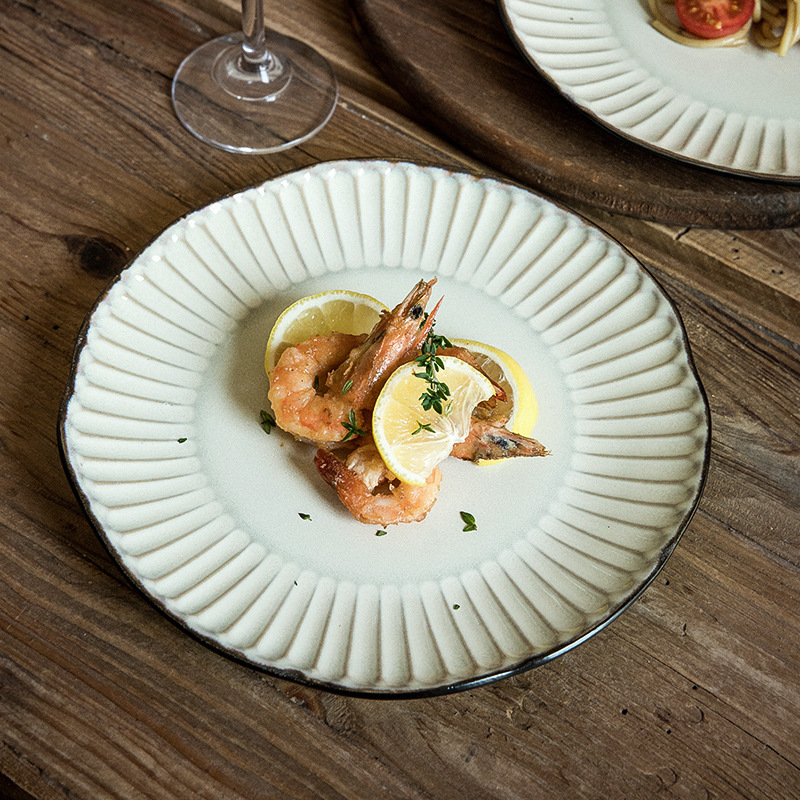 Retro irregular plato plano hermoso plato de carne en relieve plato de cerámica doméstica exportación transfronteriza