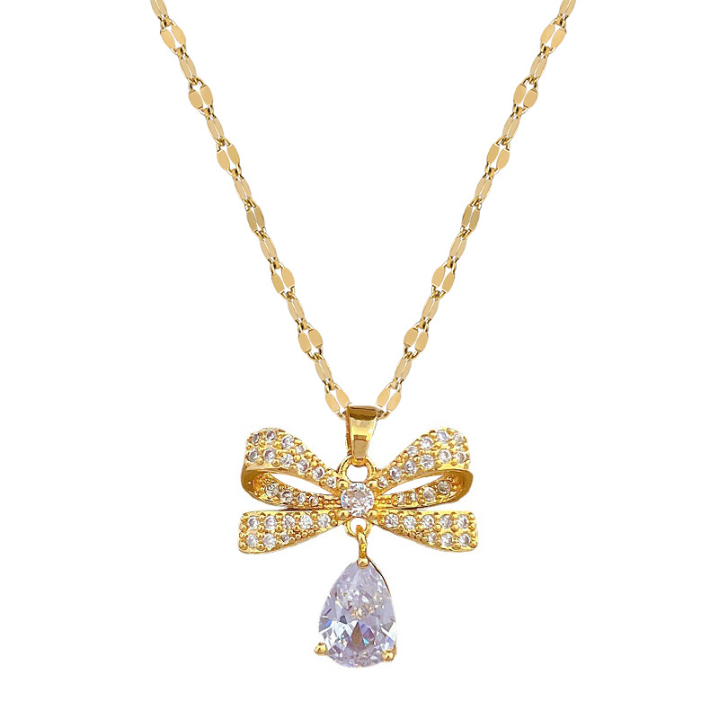 Set collana e orecchini a goccia con farfalla gioielli lusso_voghion.com