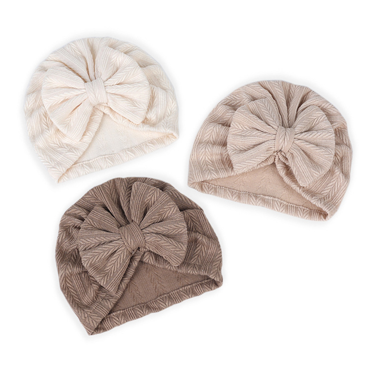 Children's Headwear Wholesale Solid Color Wheat Ear Pattern Bow Hat display picture 3