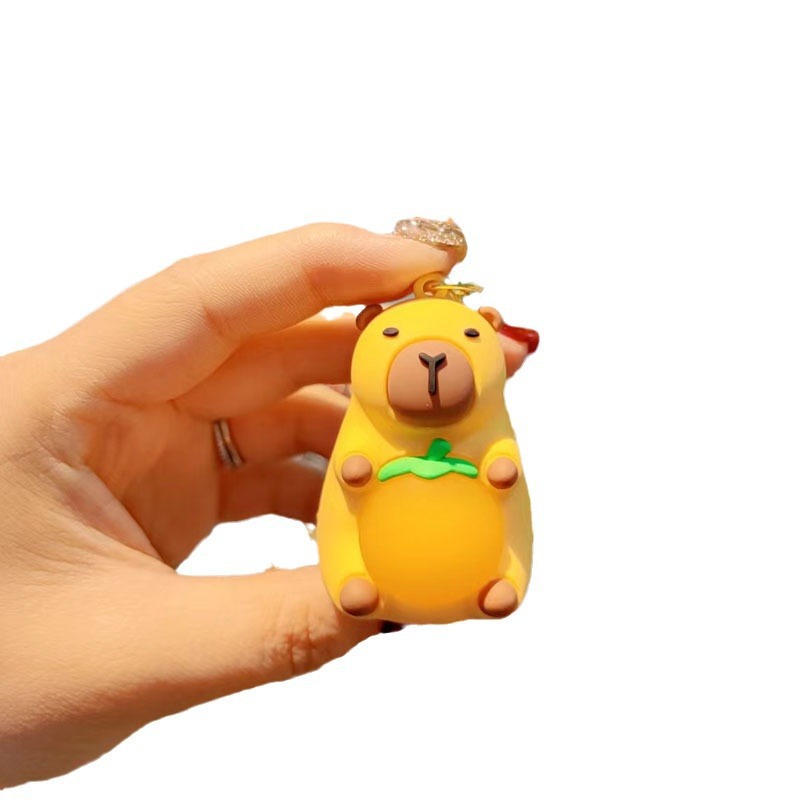 Caricatura Capibara Dolphin Doll Colgante pareja lindo llavero de automóvil bolso de pareja colgante pequeño regalo