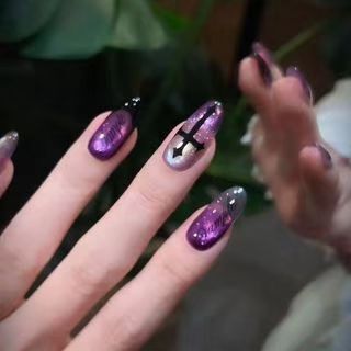 Purple-black gothic cross press-on nails with fantasy purple-pink gradient, dark and cool cyber aesthetic, fake nail patches from a cross-border factory
