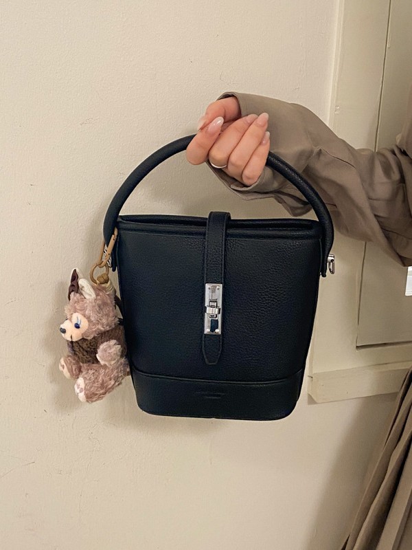 Litchi estampado bolso de cubo de mano mujer 2026 venta caliente nueva moda coreana alta textura mochila de hombro