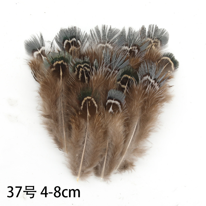 Fábrica al por mayor de bricolaje plumas pequeñas plumas naturales plumas de pollo salvaje plumas de pato jardín de infantes joyas hechas a mano gato divertido material de captura de sueños