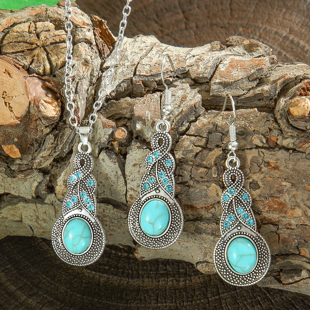 Cross-border Amazon popular estilo étnico pendientes europeos y americanos turquesa retro estilo nacional pendientes collar traje joyería