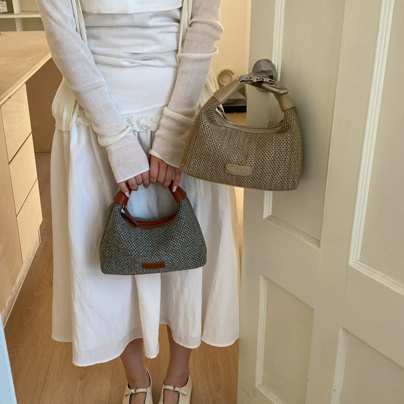 2026 verano nuevo estilo de moda bolsa de paja portátil diaria bolsas de bolsas