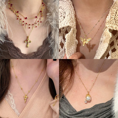 中古ヴィンテージ金色の翼のネックレス
