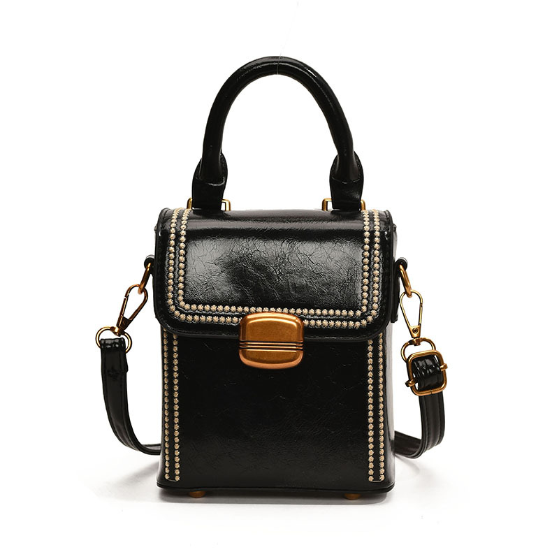 Retro versátil bolso de mano para mujeres 2025 nuevo nicho de alto nivel sensación de hombro mochila de moda bolso móvil