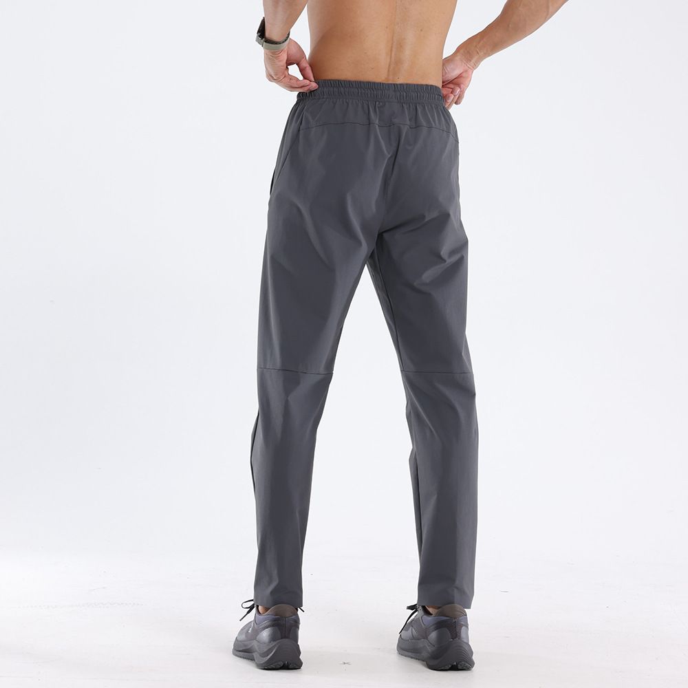 Pantalones deportivos y de ocio Lulu Pantalones de secado rápido para correr al aire libre para hombres Pantalones de entrenamiento de baloncesto sueltos Dijia para otoño e invierno