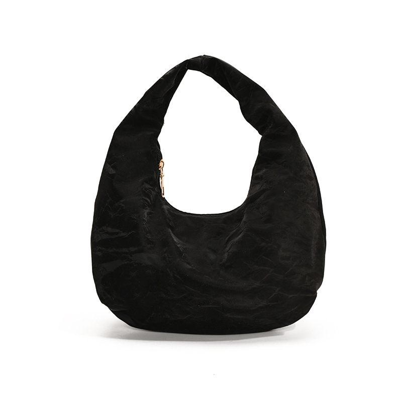 Bolso de mano plegado para mujeres 2025 primavera y verano nuevo nicho de moda bolso de hombro pequeño bolso de media luna fresco