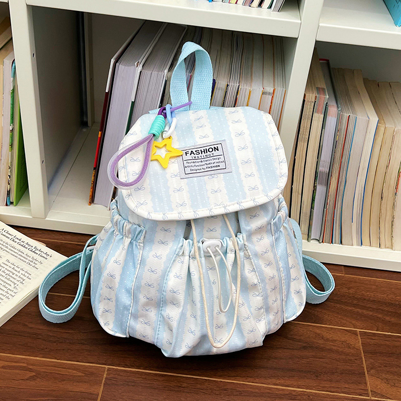 2026 nueva mochila de alta capacidad de moda simple mochila de estudiantes de secundaria a rayas de color contrastante popular dulce hombro