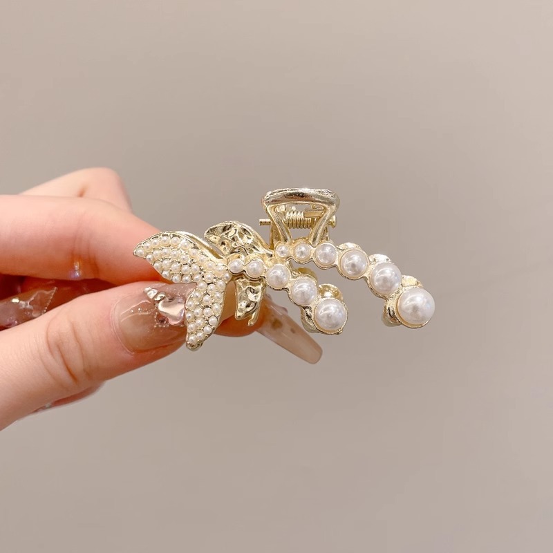 Perla de alta sensación de diamante de agarre para mujeres 2025, nuevo tipo de cabeza trasera, abrazadera de cabello, tocado, abrazadera de cabello pequeña