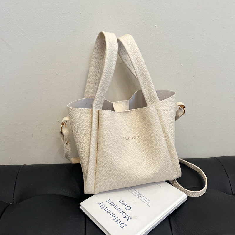 Conjunto de dos bolsos de mujer, primavera 2025, bolso de hombro de cuero suave, bolso bandolera informal y sencillo, popular este año.