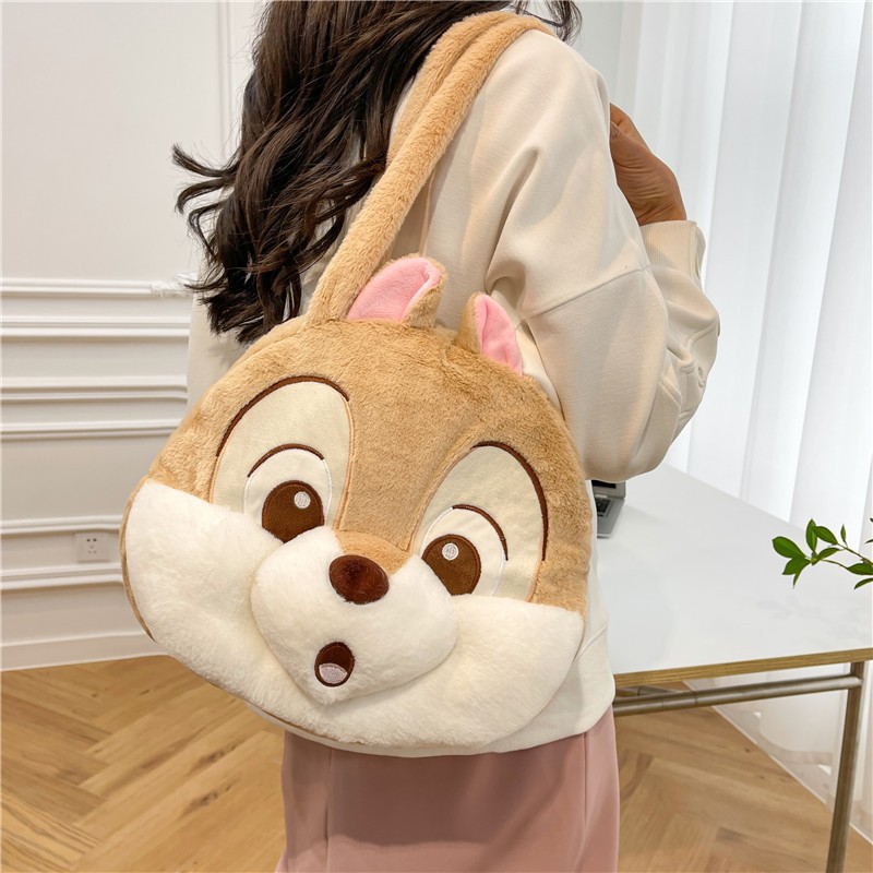 Venta al por mayor nuevo juguete de peluche fresa oso ardilla grande Satchel transfronterizo Comercio exterior muñeca bolsa grab máquina intercambio regalo