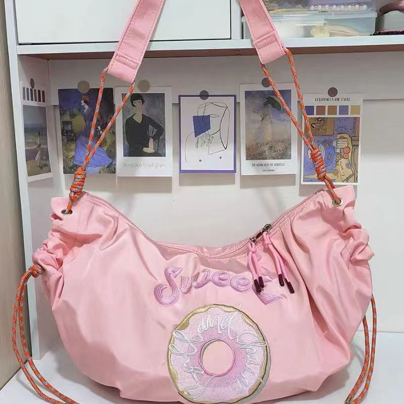 新款甜甜圈餃子包日系大容量學院風書包健身運動刺繡斜挎尼龍布包