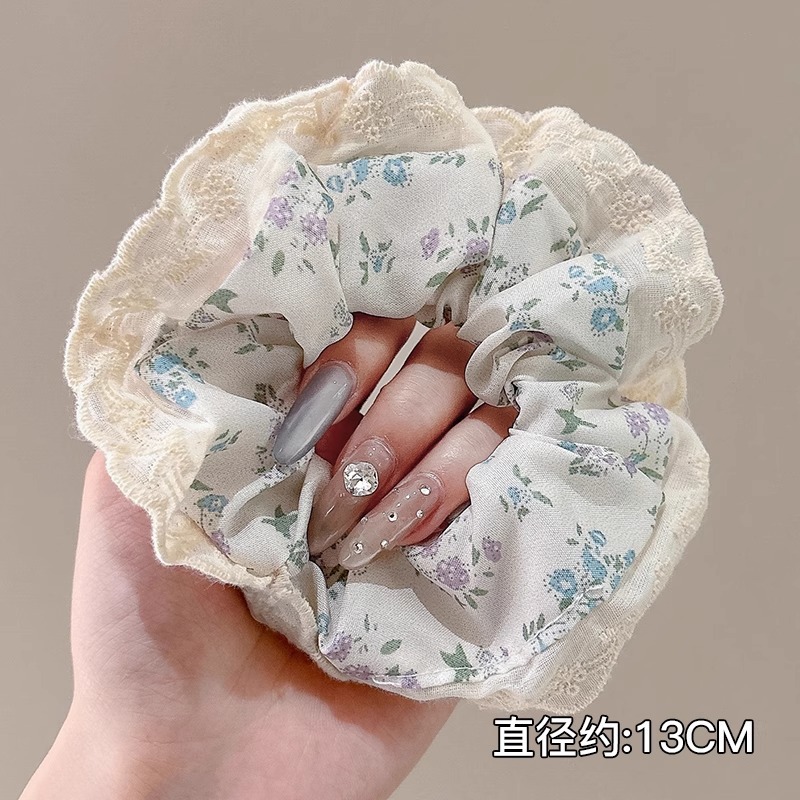 Anillo de pelo de intestino grueso súper grande coreano para mujer 2025 nuevo estilo de alta gama cordón de pelo de encaje plisado temperamento dulce cuerda de cabeza de flor