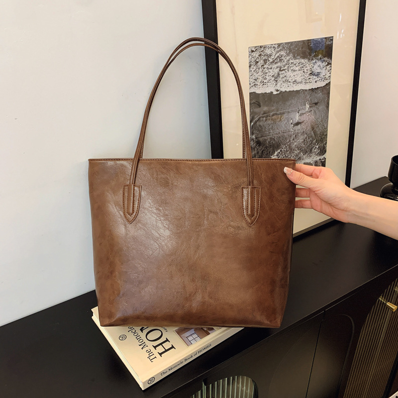 Bolso retro de gran capacidad para mujeres 2024 nueva moda coreana nicho bolso especial universal simple bolso axilar de hombro