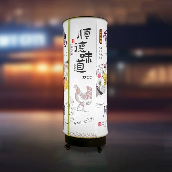 Vertical cylindrical rotating light box R50x140cm