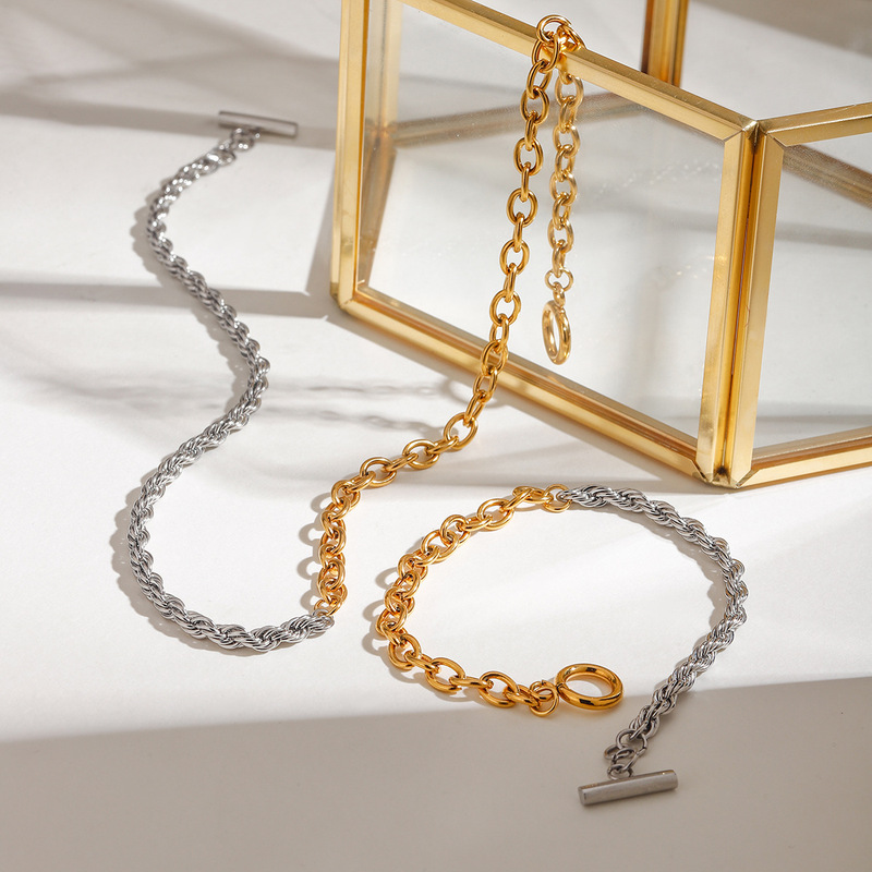 Wanxing European and American fashion titanium steel new gold and silver color matching twist chain cross chain bracelet lock light luxury stainless steel bracelet