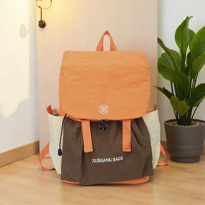 Mochila para mujeres, mochila de color ligera coreana, nicho de viaje al aire libre, mochila de montaña.