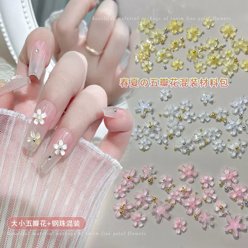 五瓣花美甲饰品混装材料包2025新款冰透白粉色花朵树脂指甲钻批发