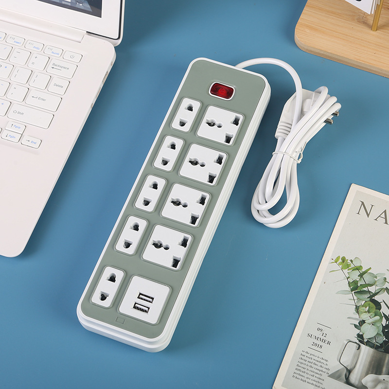 2USB África Estándar británico Estándar europeo Estándar americano Embalaje de bolsas 10 agujeros 25 conectores redondos enchufes enchufes enchufes enchufes en comercio exterior