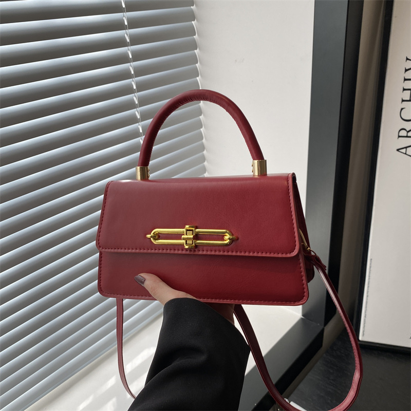 Nicho francés bolso bajo la axila para mujeres 2025 nuevo bolso cuadrado de textura personalidad bloqueo de moda mochila de hombro