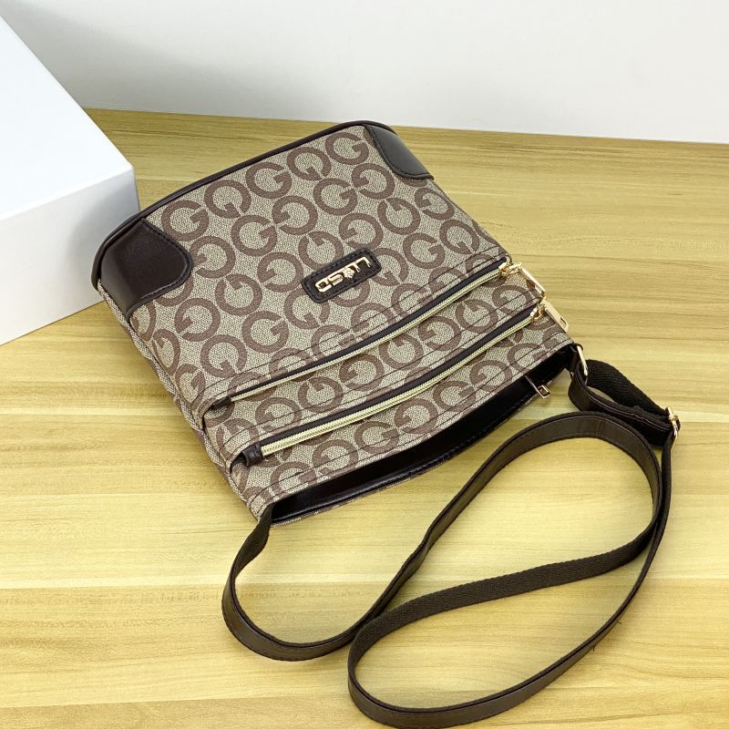 Guangzhou Hengli equipaje para mujer 2025 nuevo estilo coreano bolso de mensajero de un solo hombro bolso de cubo madre de mediana edad bolso de varias capas mujer