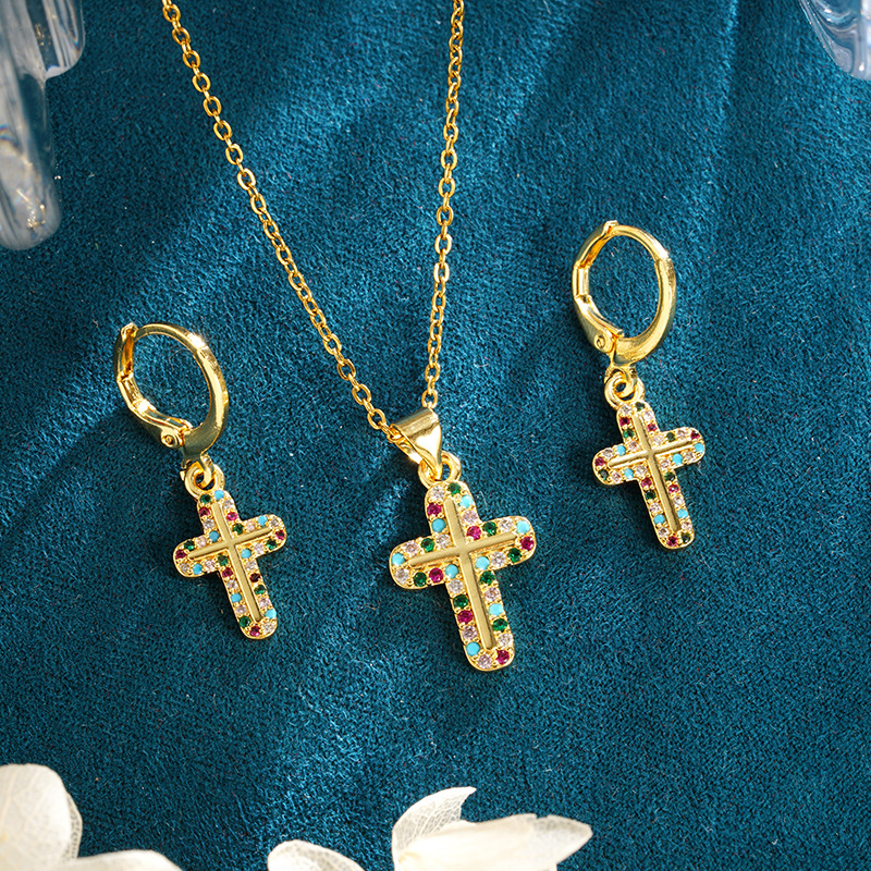 Antiguo collar de cruz de diamantes de estilo europeo y americano de oro de arena Pendientes de diseño femenino Fábrica de joyería de personalidad de todo fósforo al por mayor