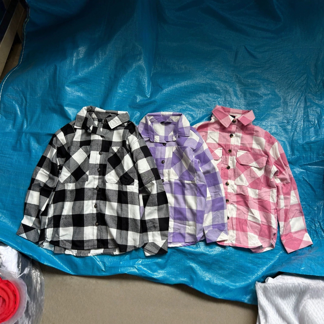 2025 camisa de algodón a placas de tamaño mediano para niños y niñas camisa de manga larga con solapa de tela de tela de primavera y otoño comercio exterior