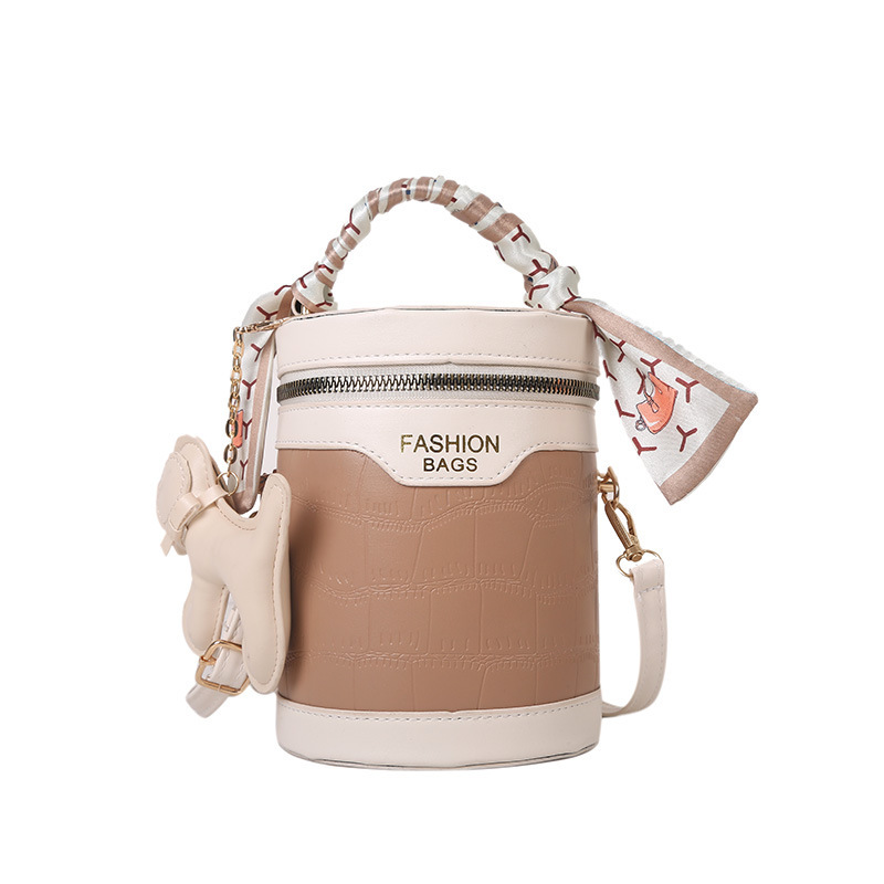 Bolso cilíndrico pequeño femenino 2022 nuevo patrón de cocodrilo moda simple bolso de mano personalizado coreano bufanda de seda bolso de mensajero