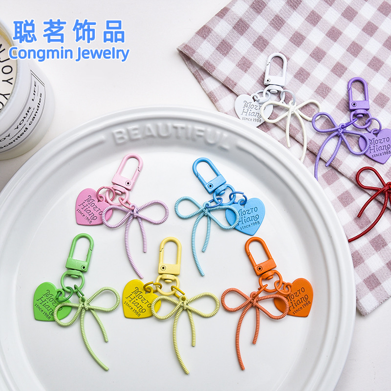Creative alloy hollow bow with color love tag key chain diy pendant girl pericardium bag ornaments Creative alloy hollow bow with color love tag key chain diy pendant girl pericardium bag ornaments