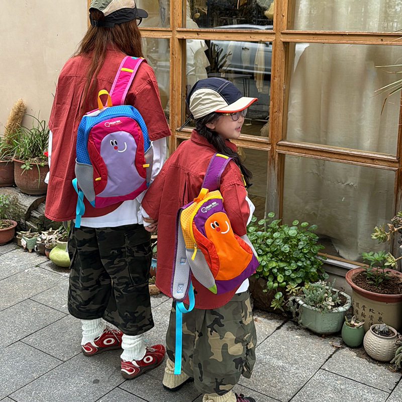 Hermosa cara sonriente para padres e hijos viajar mochila de gran capacidad de contraste de color bolsas escolares de dibujos animados lindas mochila infantil