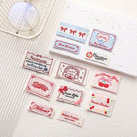 布贴;洗唛、商标;服装饰品