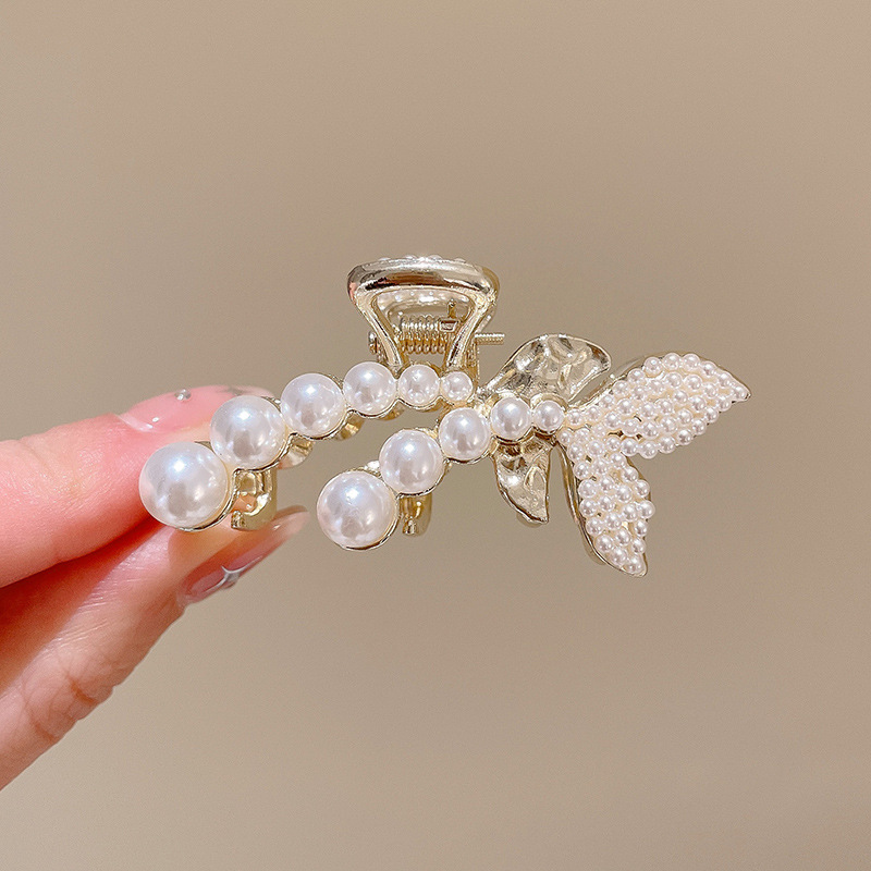 Pequeñas pinzas de cabello de perla temperamento feminino medio agarrado pinzas de cabello de borde pequeño adornamiento de cabeza de alto nivel no lastimar pinzas de cabello