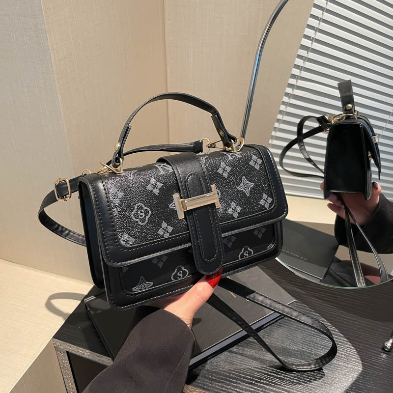 Vintage empalme este año popular bolso de mano para mujeres 2025 nueva moda impresión de letras de hombro mochila de moda