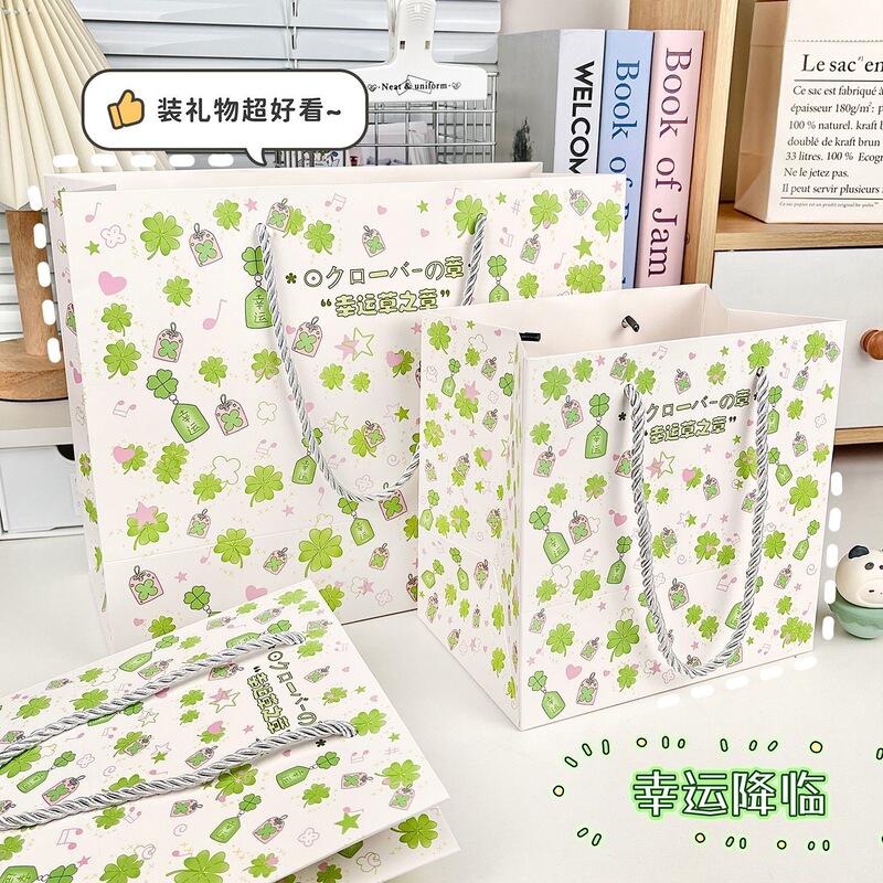 見栄えの良い四つ葉のクローバー白カードハンドバッグクリエイティブ漫画パターン見栄えの良い厚みのある大容量ショッピングバッグ|undefined