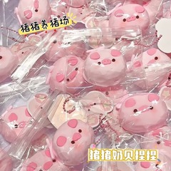 子豚の乳貝のつまみの楽しみTPRの材質のピンクの子豚の解凍のかわいいおもちゃの爆漿の赤い本のつまみの楽しみ