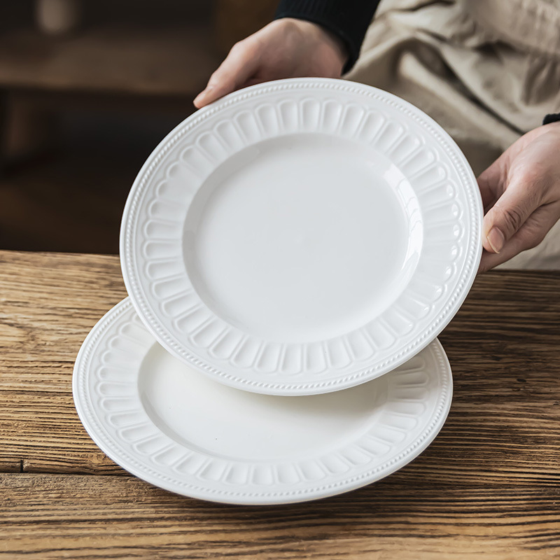 Platos de comedor blancos platos de cerámica al por mayor platos de platos caseros de alta calidad platos de platos de ensalada platos en relieve platos redondos
