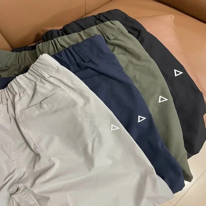 Triangle logo men's summer outdoor hiking versatile functional breathable workwear shorts casual mid-length shorts Triangle logo men's summer outdoor hiking versatile functional breathable workwear shorts casual mid-length shorts