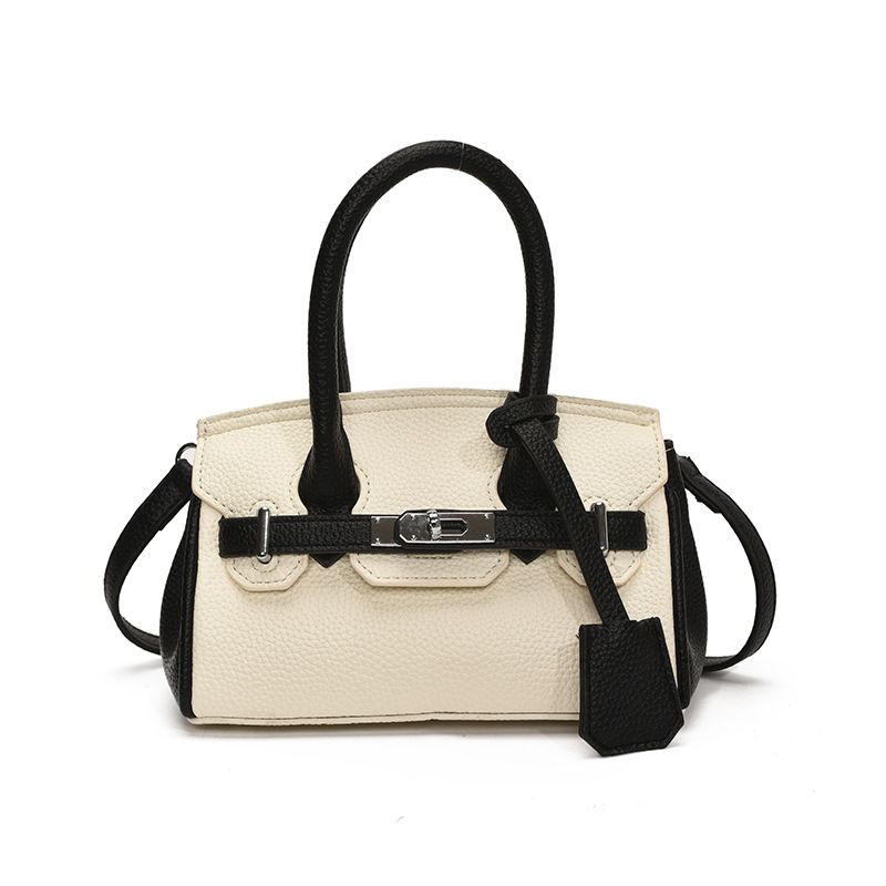 Bolso portátil de platino con textura de moda transfronteriza, bolso de hombro simple y versátil de lujo ligero, bolso de nicho de temperamento de gran capacidad