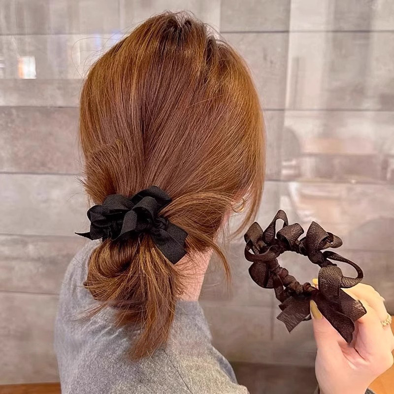 Tejido simple anillo de cabello cuerda de cabeza mujer 2025 nuevo tocado de banda de goma de cabeza de bola de alta elasticidad cuerda de cabello de cola de caballo