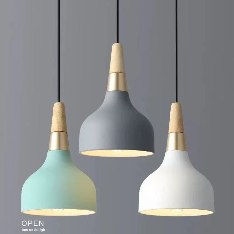 Candelabro de una sola cabeza Zhongshan, sensación avanzada, mesa de comedor de estilo cremoso creativo nórdico, lámpara de mesita de noche, araña de arte minimalista moderno