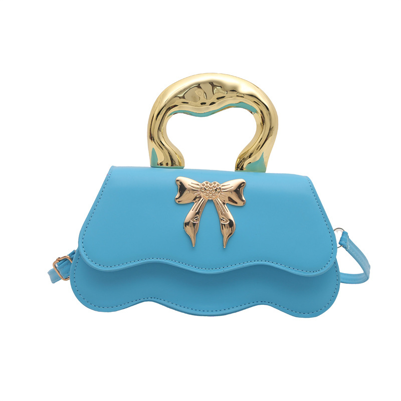 Bolso de arco ondulado damas 2024 nuevo otoño invierno bolso de hombro color caramelo estilo extranjero bolso de mochila elegante