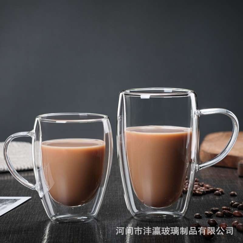 Taza de vidrio de doble capa de aislamiento térmico Taza de agua de vidrio transparente de leche con asa doméstica Taza de café de oreja plana fabricante al por mayor