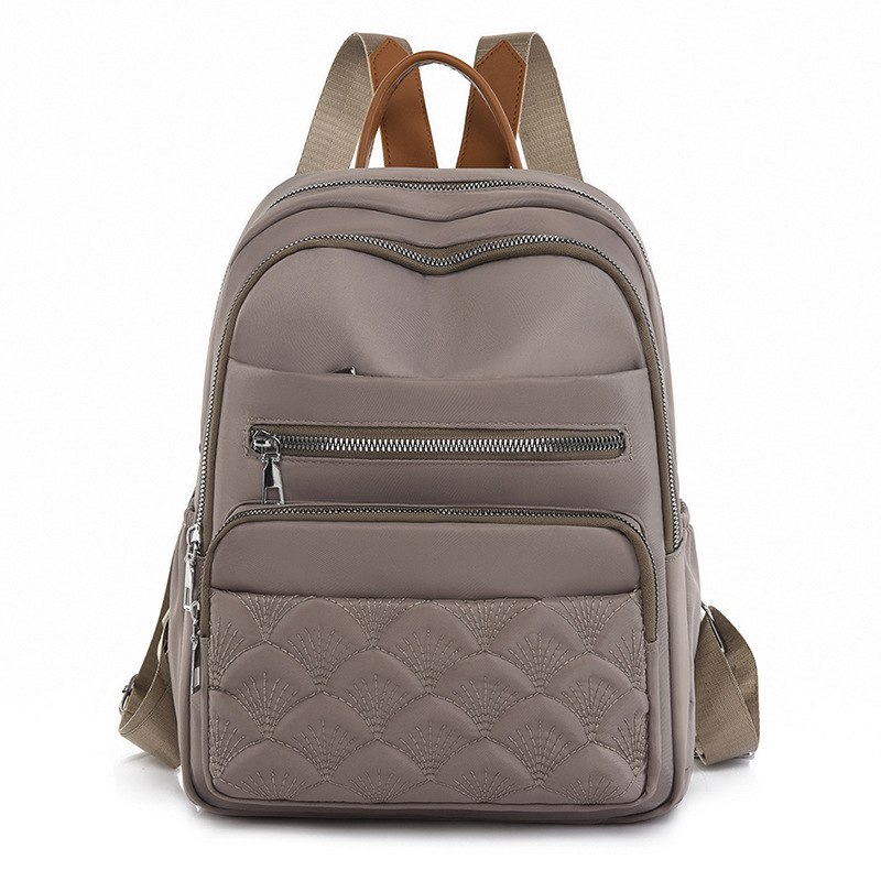 Comercio exterior al por mayor 2023 nueva mochila de tela Oxford para mujer retro casual, bordado de moda, mochila de viaje ligera