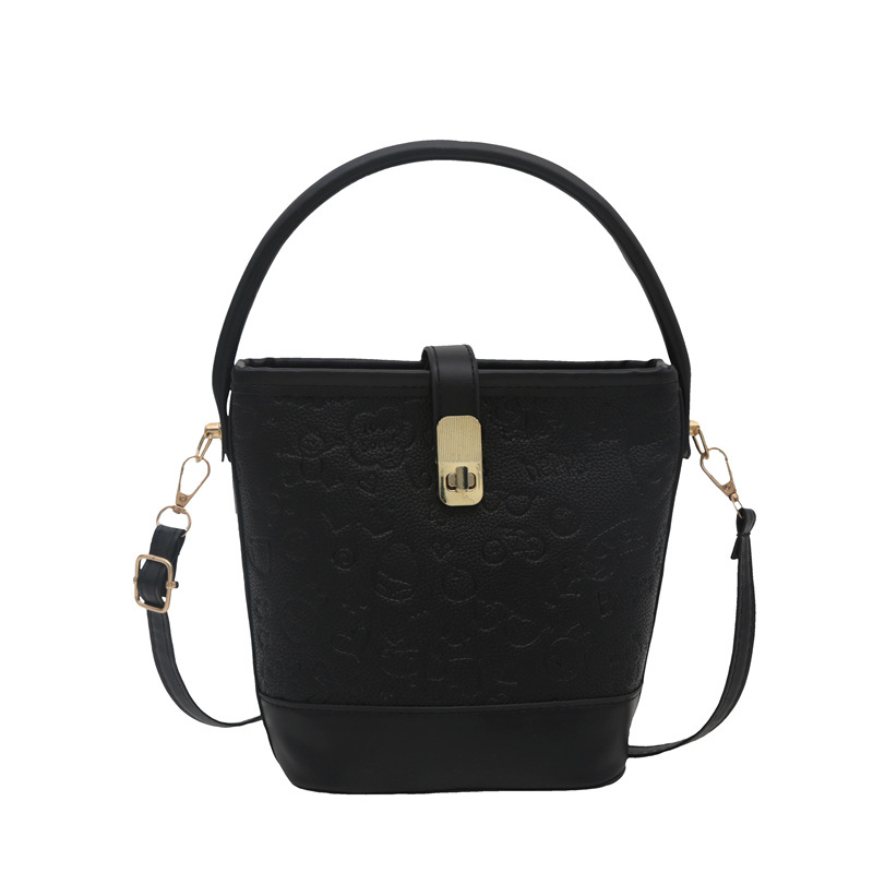 Otoño e invierno nuevo bolso de mujer 2024 moda caricatura bolso de cubo de mano versátil estilo extranjero mochila de viaje